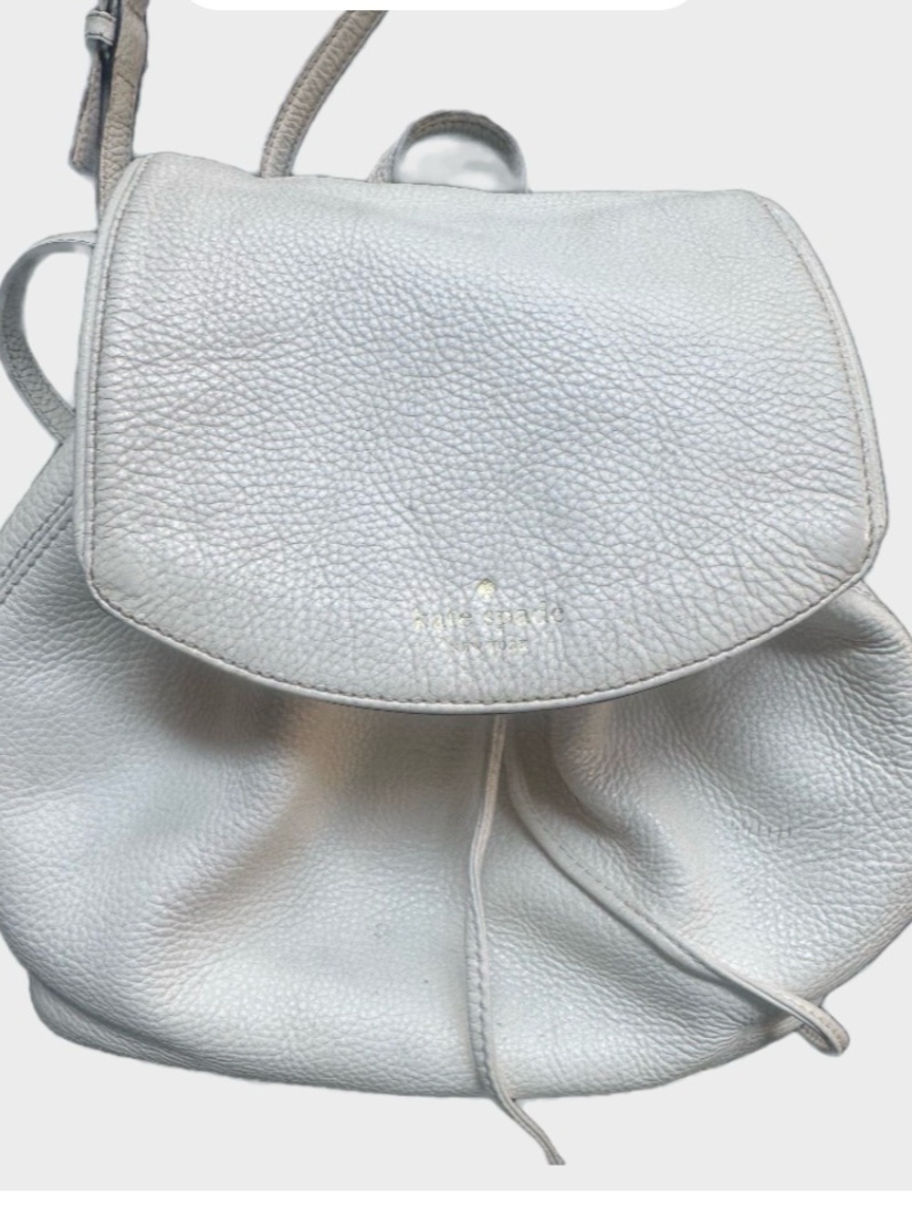Kate Spade cream pebbled leather drawstring backpack purse bag